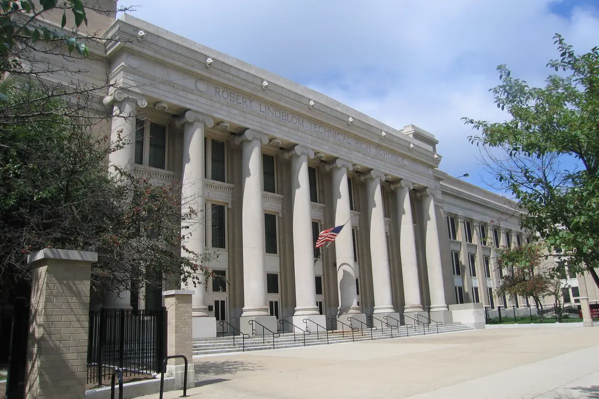 Exterior of the neoclassical main building of Lindblom Math & Science Academy